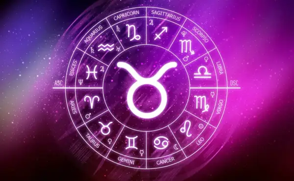 Okrąg zodiaku z symbolem Byka na pierwszym planie. 11 maja znak zodiaku to Byk, symbolizujący siłę i stabilność.